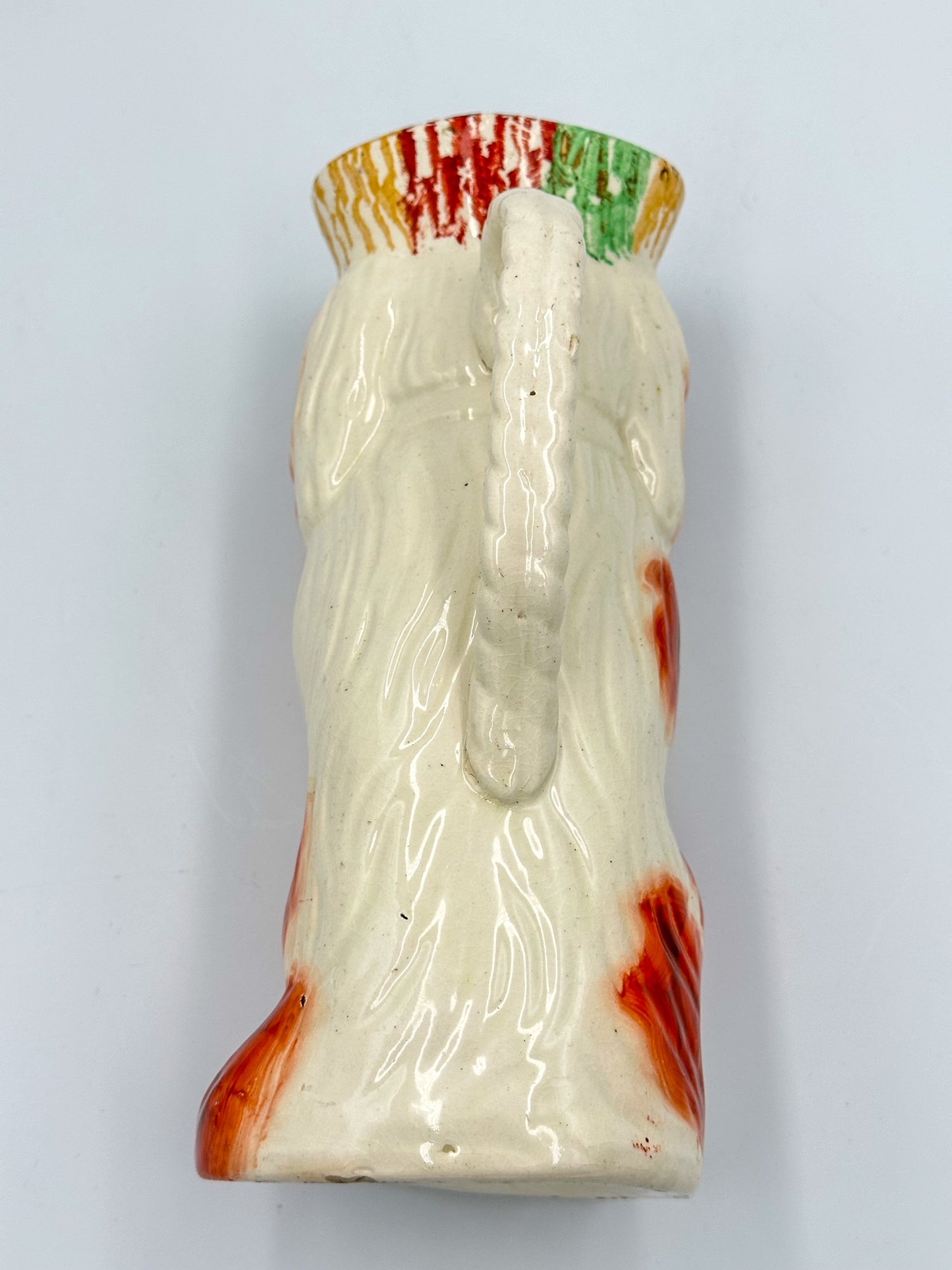 Begging Staffordshire Dog Pitcher w/ Striped Hat