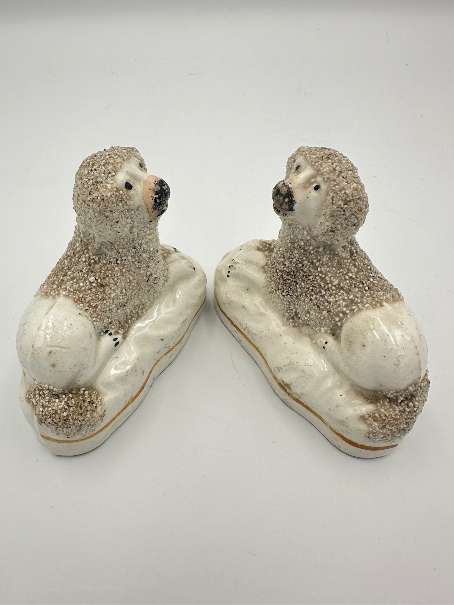 Miniature Pair of Recumbent Staffordshire Poodles