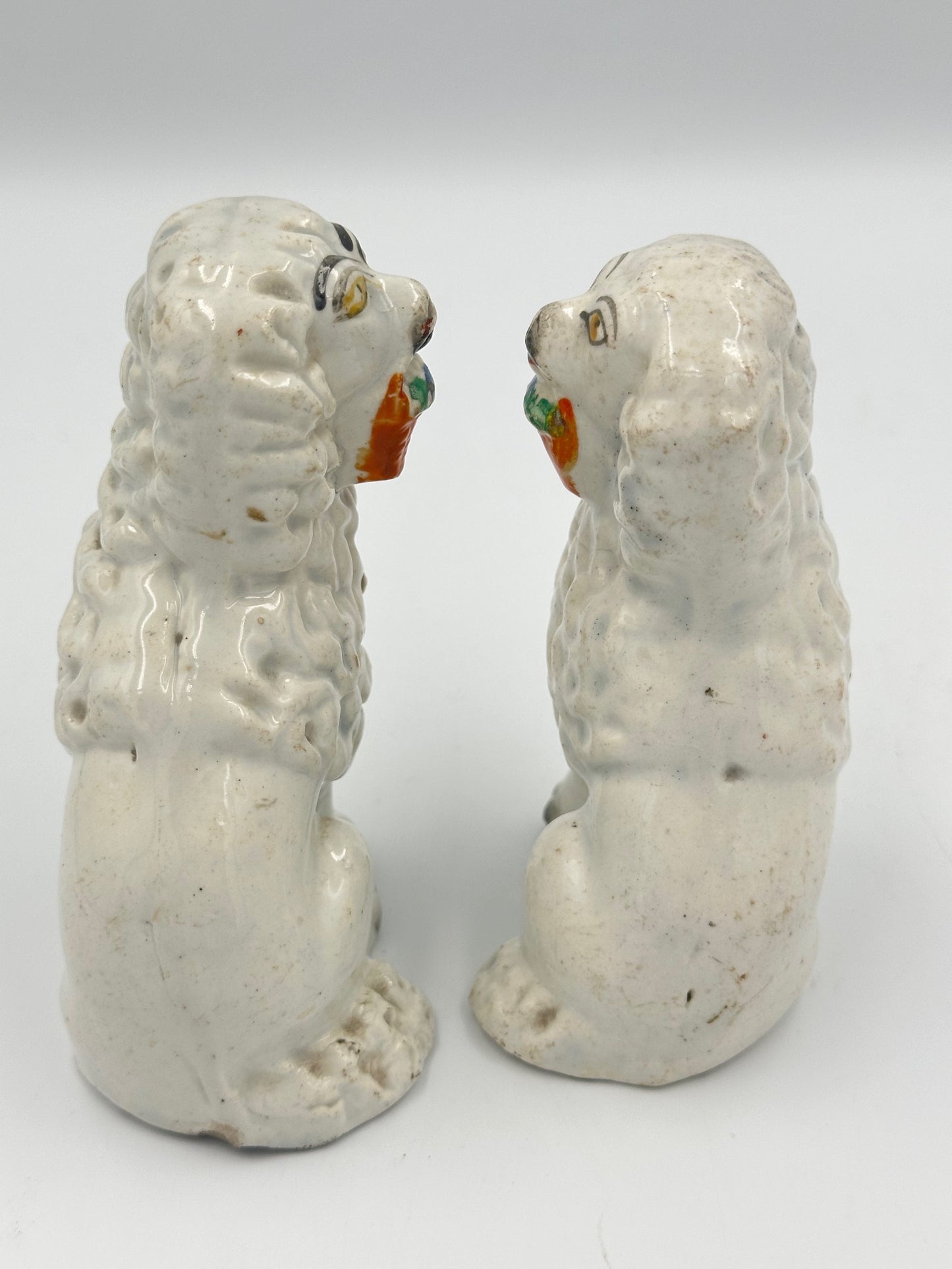 Pair of Staffordshire Poodles with Baskets