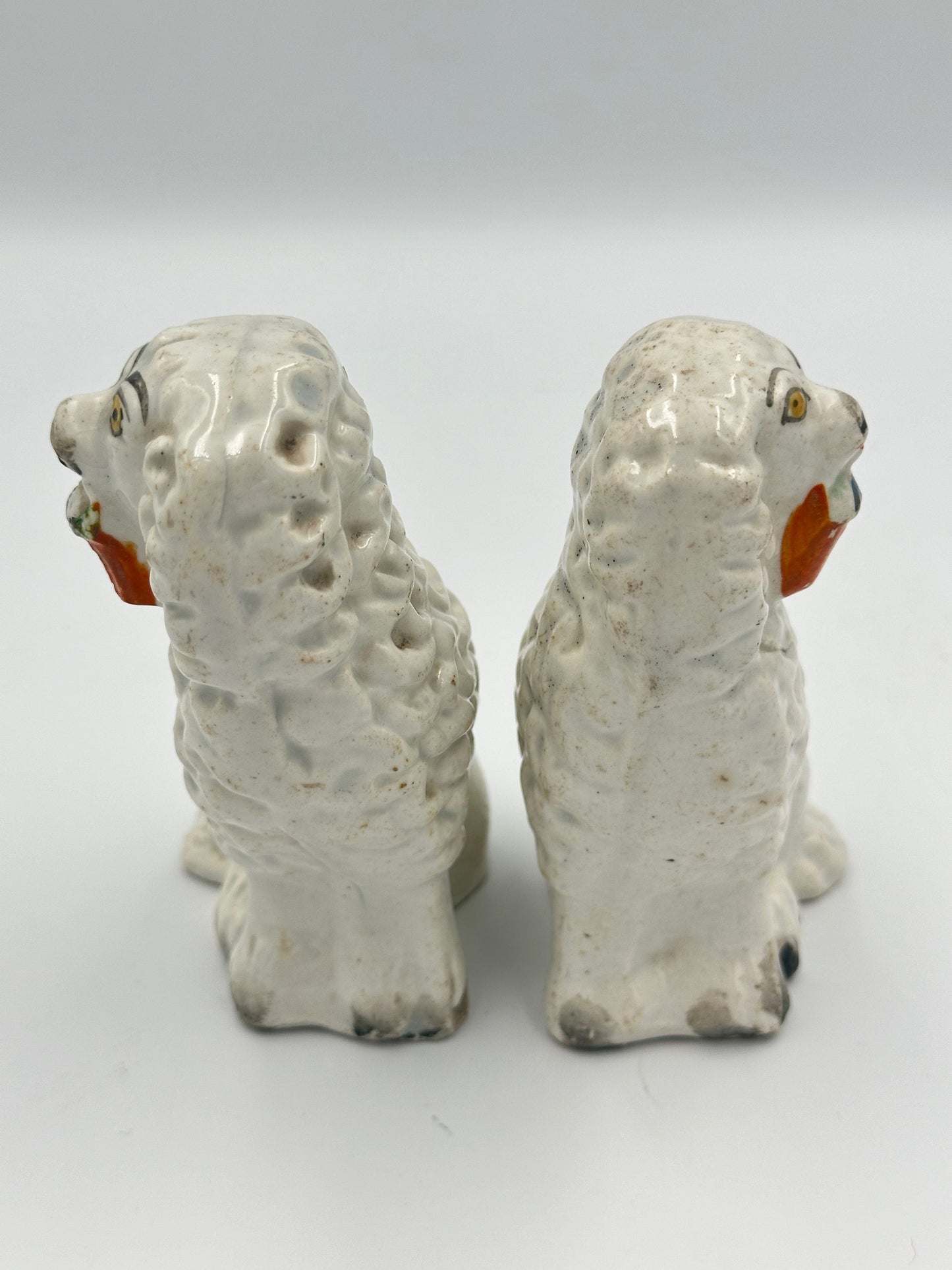 Pair of Staffordshire Poodles with Baskets