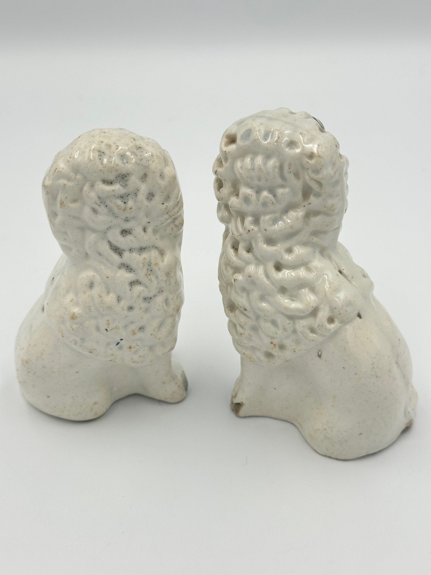 Pair of Staffordshire Poodles with Baskets