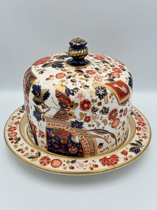 Antique Ridgway Old Derby Imari pattern cheese dome with floral and geometric designs, featuring a domed finial handle and gilding.
