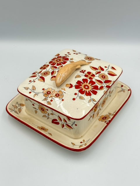 Antique patterned English porcelain sardine dish with floral designs and a fish handle on the lid.